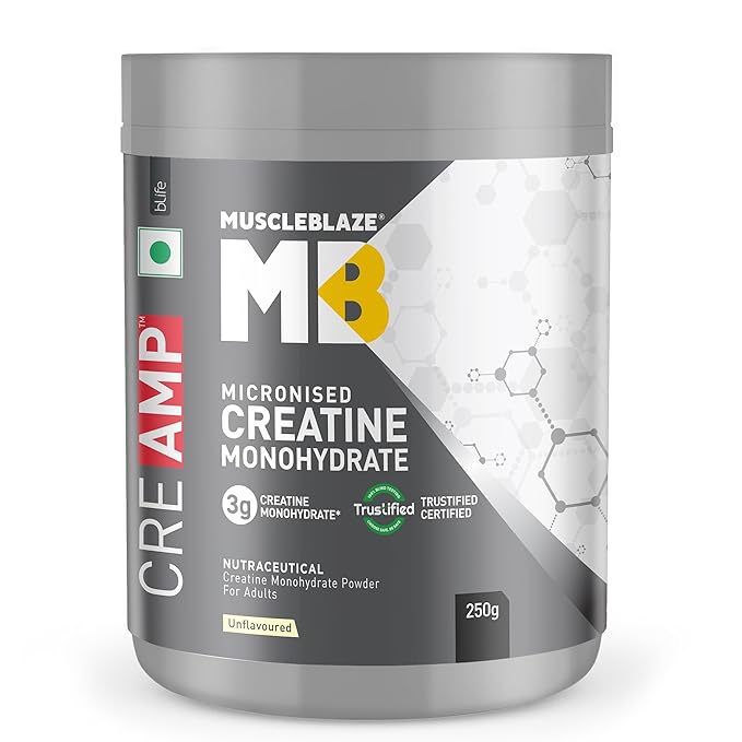 MuscleBlaze Creatine supplement displayed in a bold, high-quality container with the MuscleBlaze logo prominently featured. The packaging is striking, with a combination of black and yellow colors, reflecting the brand's strong and energetic identity. Next to the container, a shaker bottle filled with water and a scoop of creatine powder, ready for mixing. In the background, a well-equipped gym with weights and machines creates an active and motivating atmosphere. The image highlights MuscleBlaze Creatine as a top choice for fitness enthusiasts looking to boost strength, endurance, and overall performance