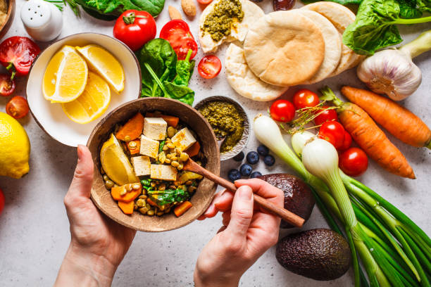 Healthy vegetarian food background. Vegetables, hummus, pesto and lentil curry with tofu. , chennai , fat loss , calofit , weight loss , fat loss chennai ,